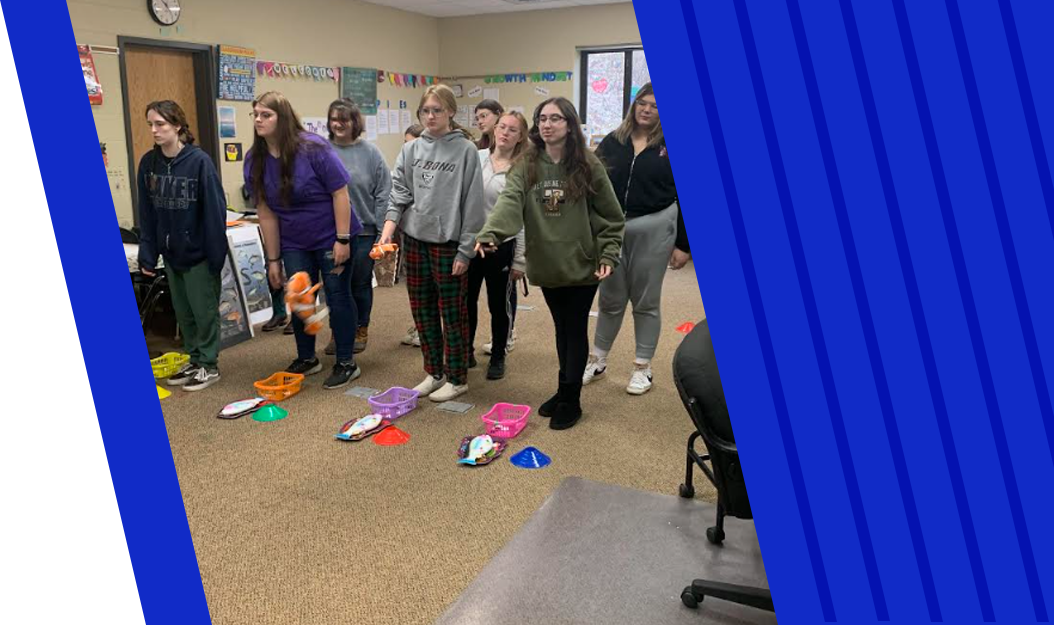 Young lady enjoying working in a preschool classroom