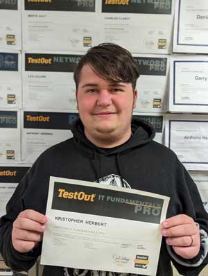 Kristopher Herbert holding his IT Fundamentals Pro certification