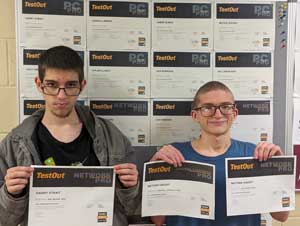 Garry and Nathan holding their certificates