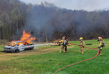 Fire fighters putting out a fire